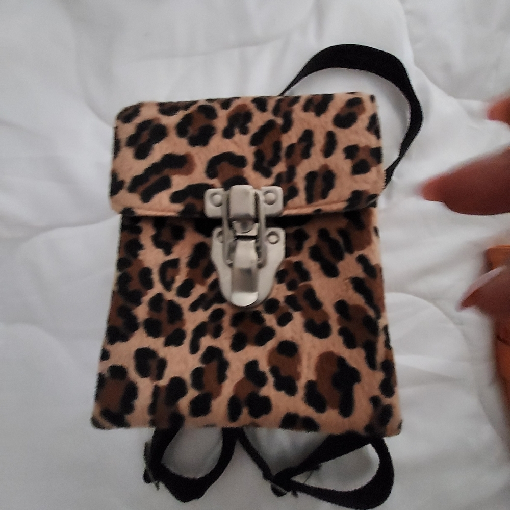 Short Haired Faux Fur Leopard Backpack.